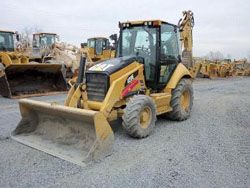 Экскаваторы-погрузчики Caterpillar 420E ST