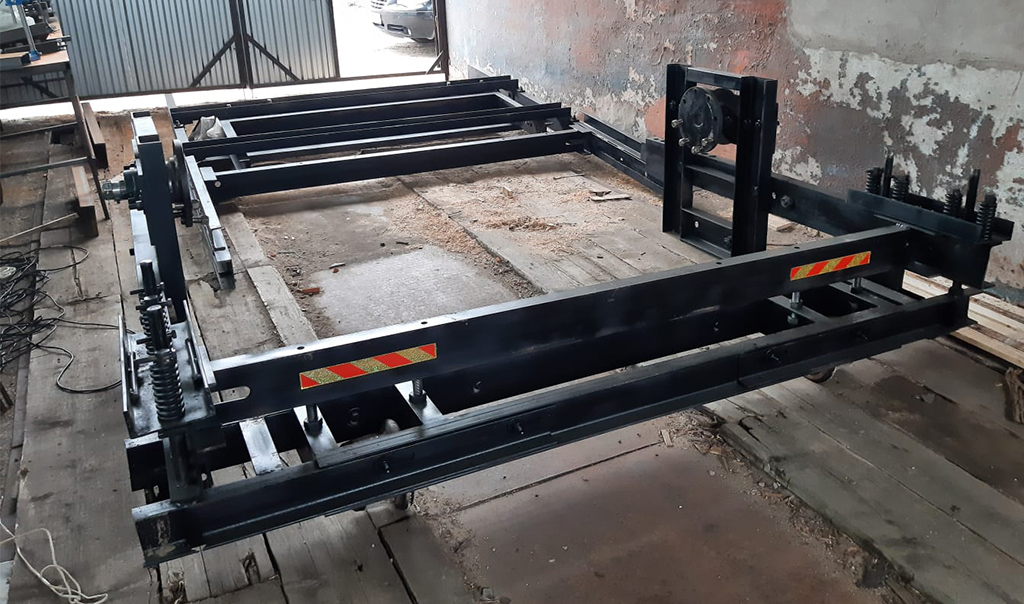 Решение использовать рельсовые тележки позволило снизить затраты на обслуживание инфраструктуры предприятия