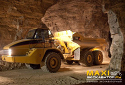 Самосвал с шарнирно-сочлененной рамой и принудительной разгрузкой Cat 740 Ejector