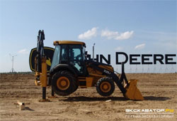 Экскаватор-погрузчик John Deere 325J