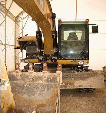 Продается колесный экскаватор Сaterpillar M318D 