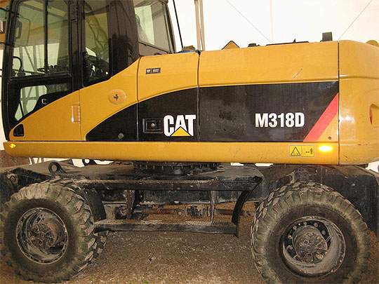 Продается колесный экскаватор Сaterpillar M318D