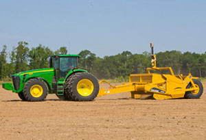 скрепер John Deere 1512E