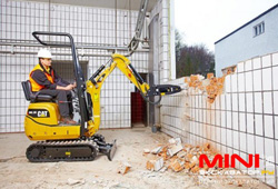 Гусеничный мини-экскаватор Caterpillar 300 9D c гидромолотом