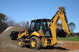 Экскаватор-погрузчик Caterpillar серии F