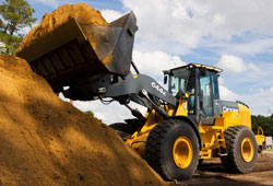 Экскаватор-погрузчи John Deere 710J