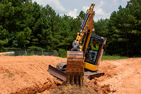 Компания Caterpillar создала гидравлическое устройство Dual Lock Tilt