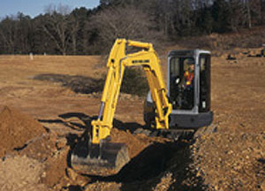 Мини-экскаватор New Holland