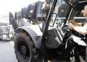 Погрузчик с телескопической стрелой Cat TL 1255