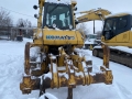 Komatsu D65E-12 [9]