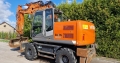 Hitachi ZX140W [21]