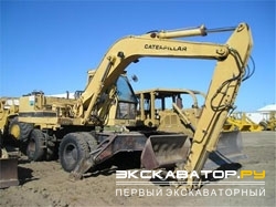 Колесные экскаваторы Caterpillar 214